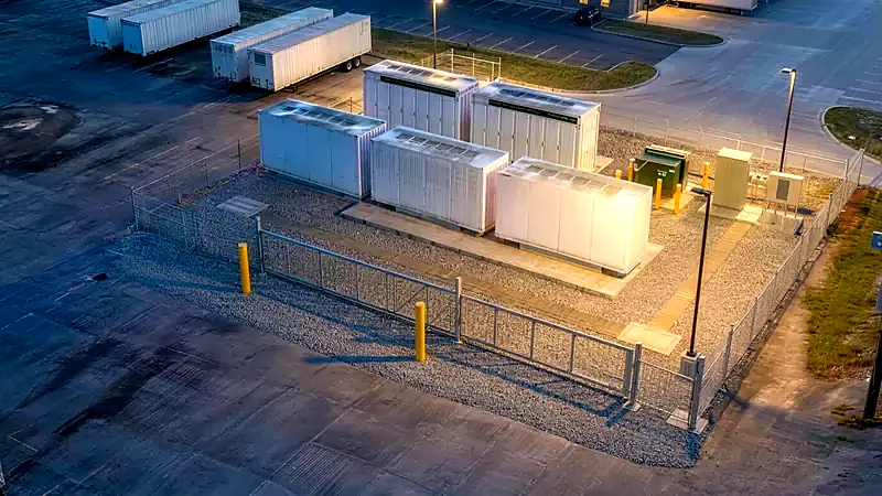 Rendered dusk view of the completed installation task-lit inside the working yard.